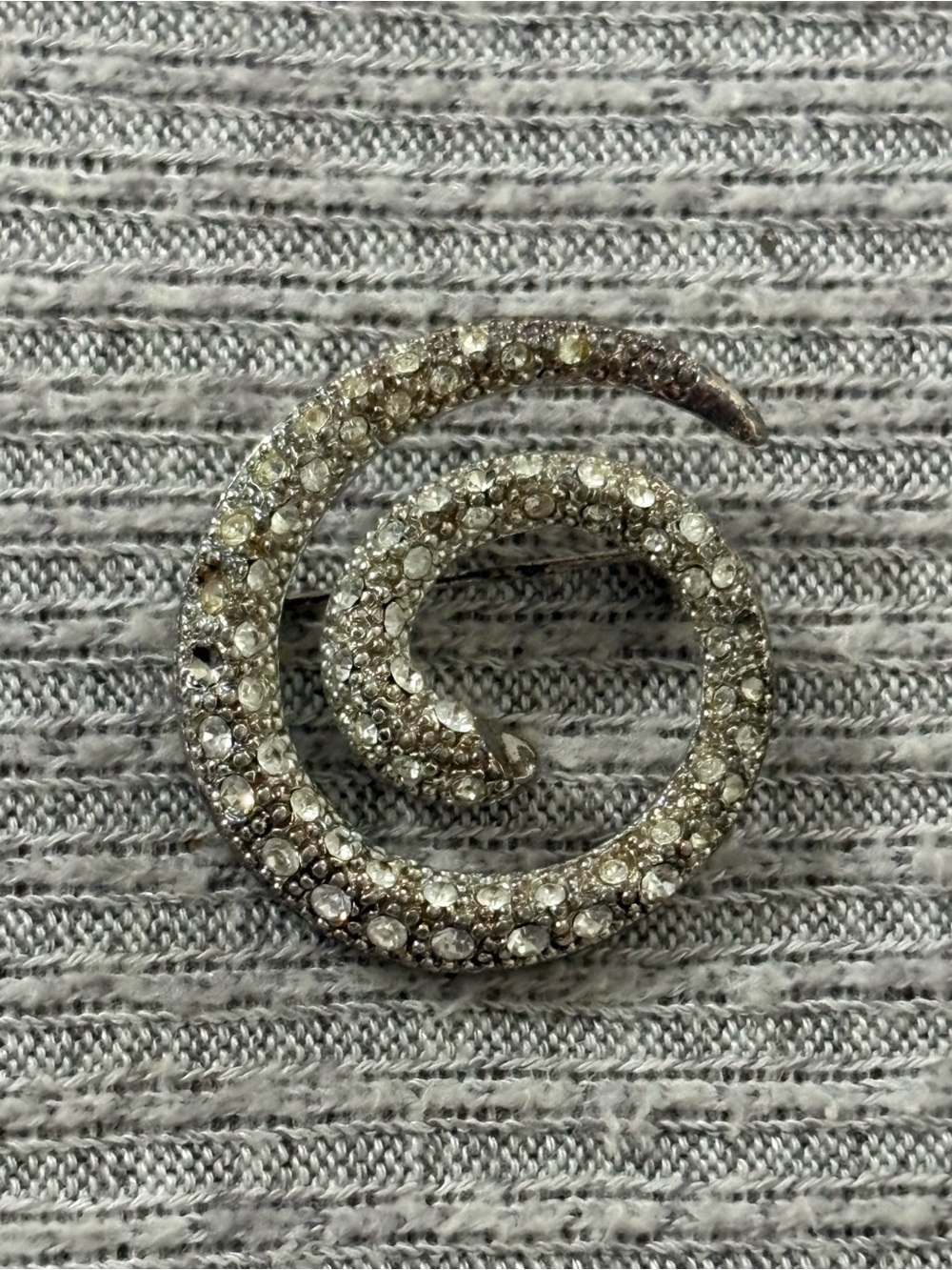 Vintage silver tone spiral design brooch w clear rhinestones-missing few stones